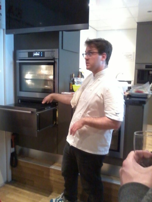 Tim Anderson demonstrating how to use the AEG SousVide oven at Grand Designs Live