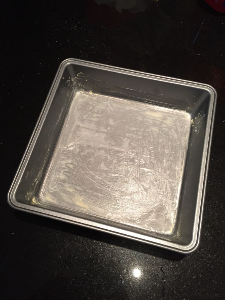 Spread into a lined greased tin, pushing the mixture into the corners