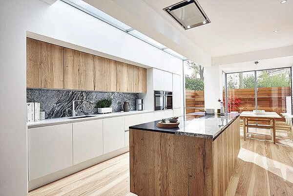 BioGraphy kitchen featuring Porter Matt White doors with Reclaimed Oak feature doors