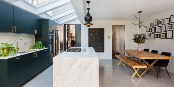 A fantastic black gothic kitchen with modern cabinets, refined